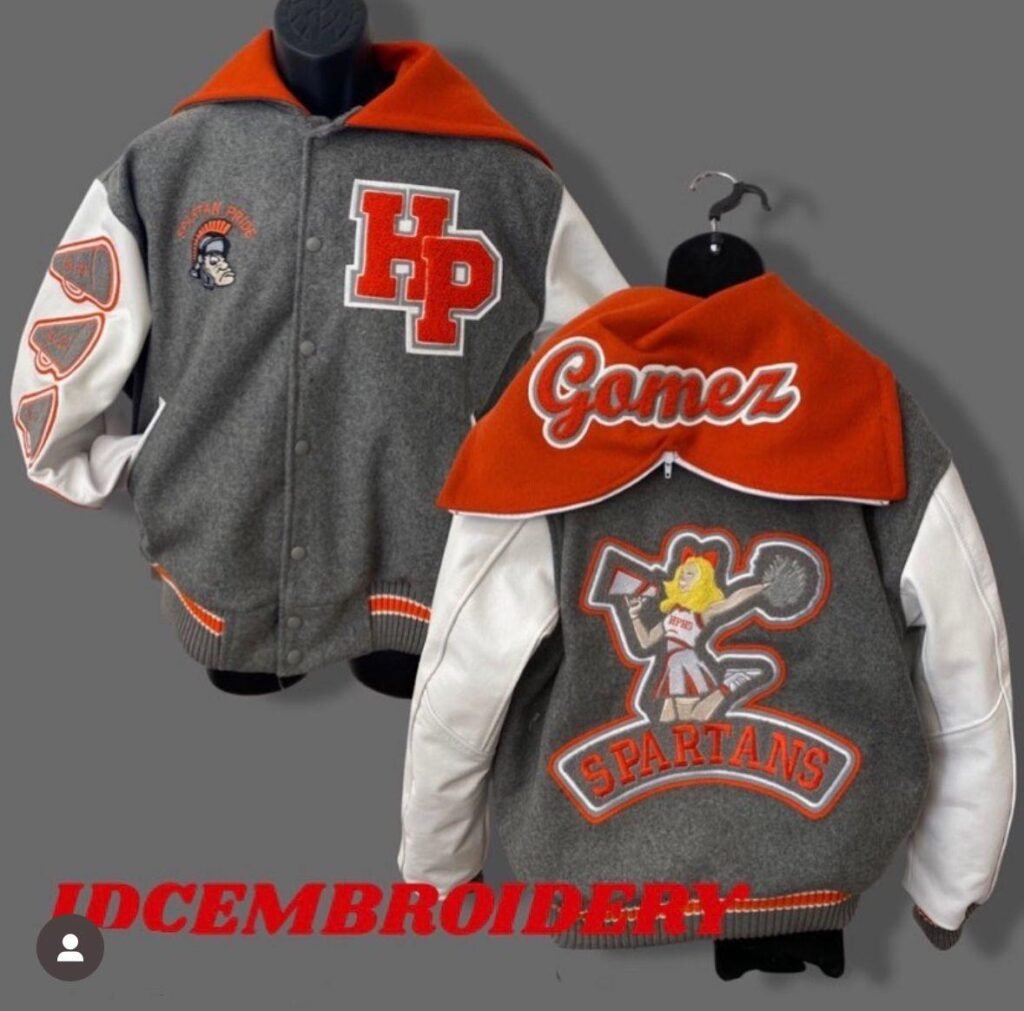 Custom gray and red letterman jackets with embroidered patches and chenille lettering.