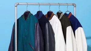 Collection of varsity letterman jackets hanging together, illustrating matching jacket styles for school and team group orders.