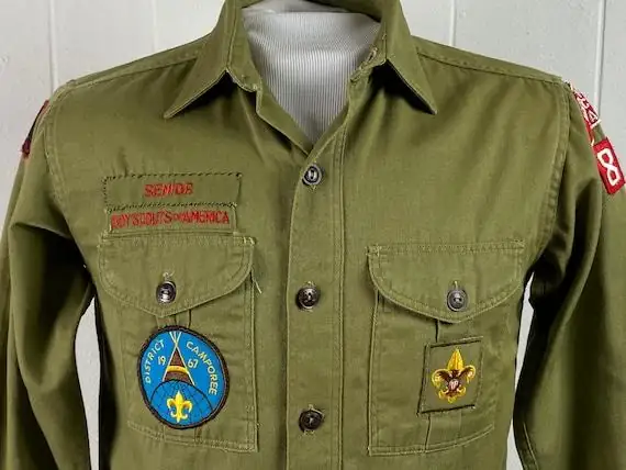 Close-up of an embroidered fabric patch attached to clothing