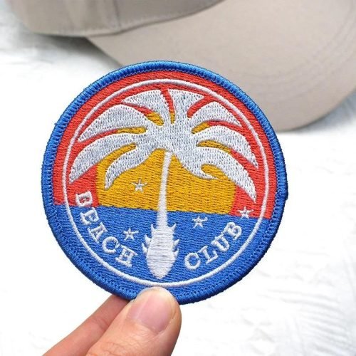 Palm Tree Design Logo on a custom woven Patch  by idc-embroidery